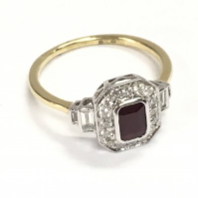 18ct white and yellow gold art deco style ring set with step cut ruby surrounded by diamonds. Ruby 0.60ct diamonds 0.41ct. Size O Postage A
