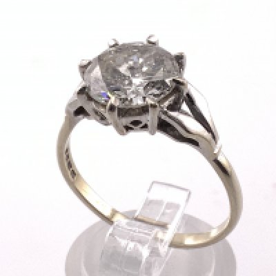 A large approx 2.75ct solitare diamond ring. (Diameter 10mm x 4.5mm approximately) some inclusions, with 18ct gold ring mount, Size S. (A)