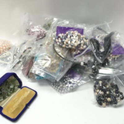 A large collection of various costume jewellery beaded necklaces. Postage catC