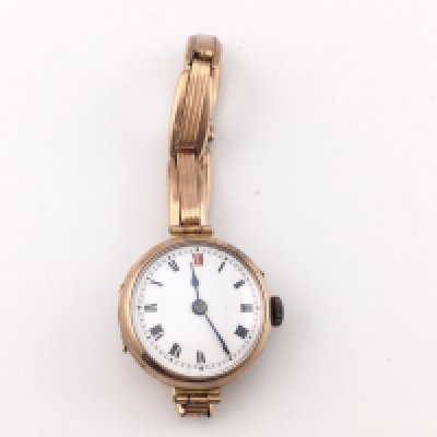 A vintage 9ct gold watch. 20.07g . Not seen running. Postage B