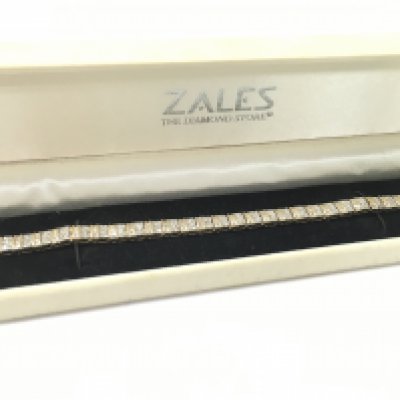A 10k gold and diamond bracelet , 18cm long. Total weight 18.7g Postage category A