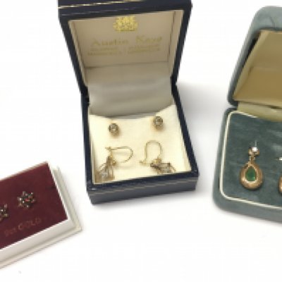 A Collection of gold earrings including emerald and diamond, diamond studs etc. 5.9g total weight. Postage category A