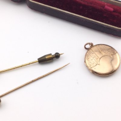 Two Edwardian stick pins and a 9ct gold locket 3.42 Postage B