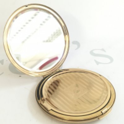 A Stratton initial powder compact. This lot cannot be posted. NO RESERVE