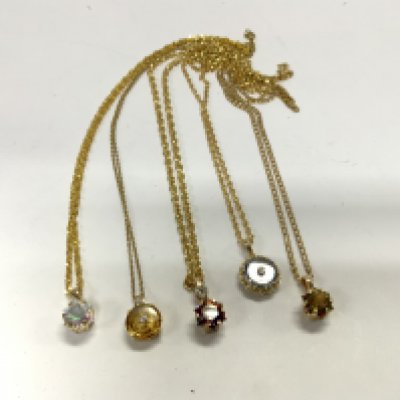 5 9ct gold and stone set pendants and chains. Total weight. 27.7g (A)