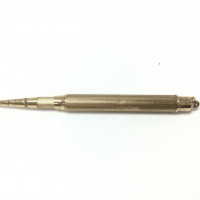 A 9ct gold pencil by Samson and Morgan. 33.87g