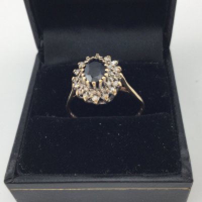 A 9ct sapphire and diamond ring. Approx size v approx weight 2.44 grams.