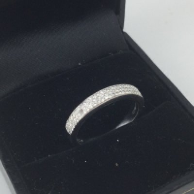 A 9ct white gold diamond set ring. Approx weight 2.26 grams. Size J.