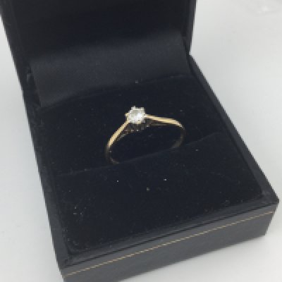 An 18ct gold diamond solitaire ring. Size K.