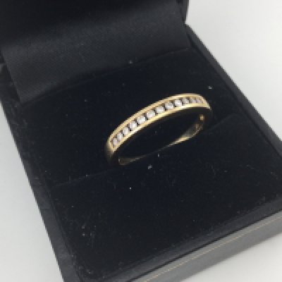 A 9ct gold and diamond ring. Approx weight 2.2 grams.