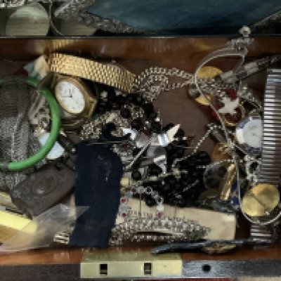 A mixed collection of costume jewellery, silver photo frames and small articles. (D)