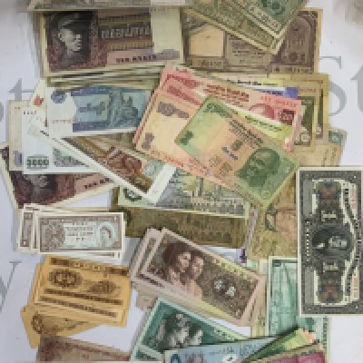 A large collection of world banknotes. (B)