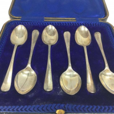 A boxed set of six silver hallmarked spoons approx 11 grams each.