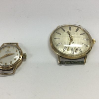 a 14ct gold case Waltham wristwatch and a 9ct gold cased ladies omega watch.