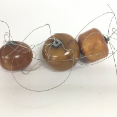 Three large amber beads.