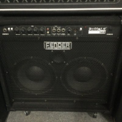 A Fender Rumble 100 amplifier. <a href="https://www.the-saleroom.com/en-gb/auction-catalogues/staceys-auctioneers-and-valuers/catalogue-id-srsta10351/lot-3ce190de-46e6-4cf5-8db5-b2410115294e"> Click Here to Register to bid </a>