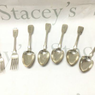 A collection of silver hallmarked cutlery including spoons and forks , postage category A