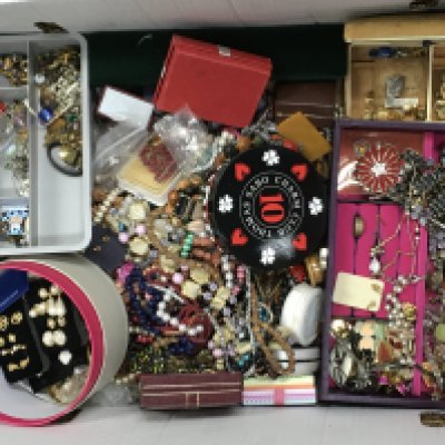 A large box of costume jewellery including rings, necklaces etc