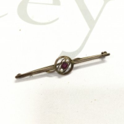 A 9ct gold ruby and pearl set brooch. NO RESERVE