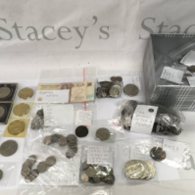 A box containing assorted used circulated coinage and some commemorative packs. NO RESERVE