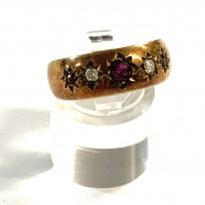 A 9ct gold Ruby and diamond ring (A) 5.8g.