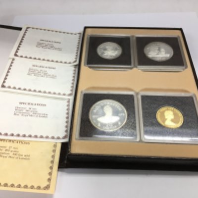 A turks and caicos silver and gold coin set. Includes a approx 13g 12ct gold coin. Postage B