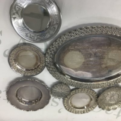 A collection of seven small silver dishes . 442 grams.