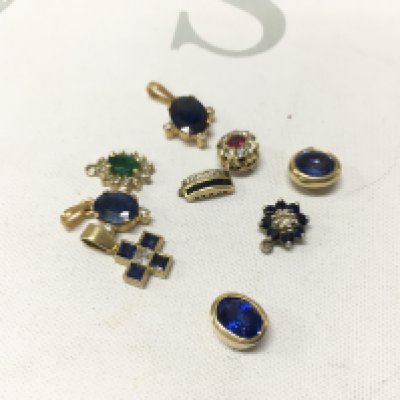 A mixed assortment of unmarked stone set pendants. Approx weight 12grams.