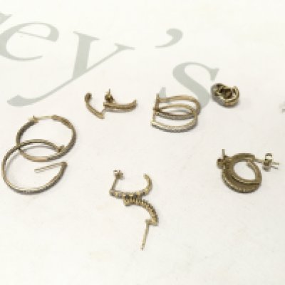 Six pairs of 9ct gold stone set hoop style earrings. Approx weight 13 grams.