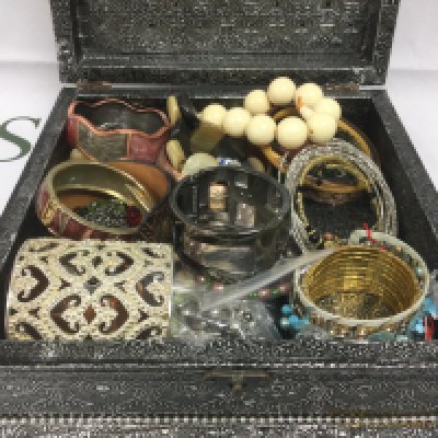 A jewellery box of bangles and bracelets. Shipping category B.