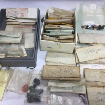 A collection of precious and semi precious stones including diamond chips, sapphires, rubies, emeralds, amethyst and others. Shipping category B.