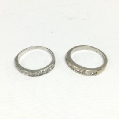 Two 18ct white gold half hoop diamond rings, approx total weight 5.6g and approx size M. Shipping category A.