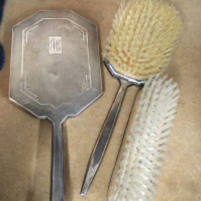 A 1920s silver hair brushes and hand mirror