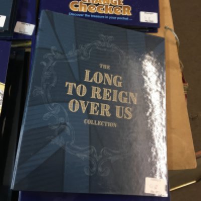 7 folders including change checker containing various 50p collections and &pound;5 coins