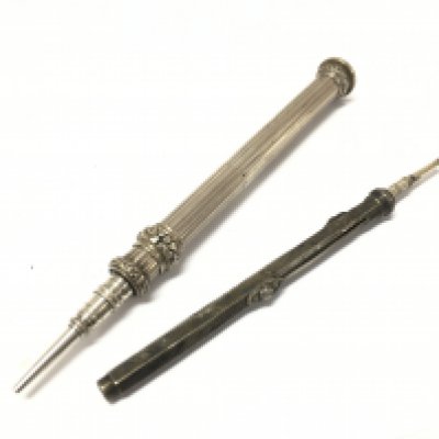 Two hallmarked silver propelling pencils , postage category A