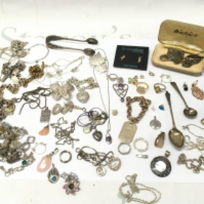 A collection of jewellery mostly silver including necklaces, rings, pendants, silver hallmarked spoons etc. postage category B