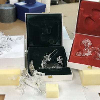 Four Swarovski figures including "Fabulous Creatures" Unicorn, Pearl Dragons and Pegasus- all boxed