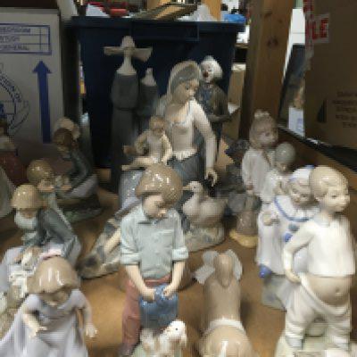 A collection of Nao figures various including large mother and child, Golden Memories figure etc