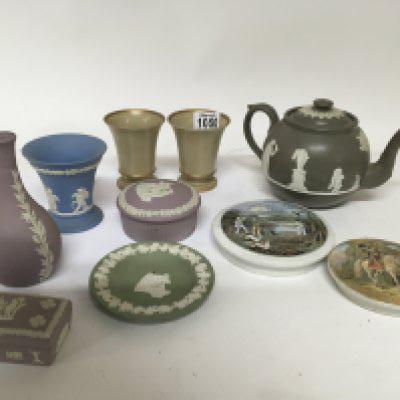 Two early 19th century beakers later Wedgwood ceramics including a tea pot and two late 19th century pot lids.