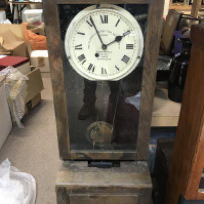 A large oak cased clocking in clock. NO RESERVE