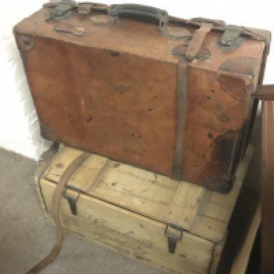 A Gordons london dry gin crate and a vintage leather suitcase. NO RESERVE