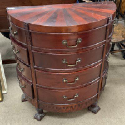 A reproduction half moon shaped chest of drawers. 76cm x 67cm x 33cm