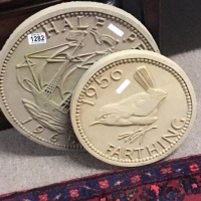 Two large cast composition copy British 1956 Farthing and 1965 Half penny garden ornaments. 41cm(2)