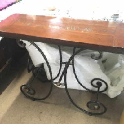 A modern hardwood and wrought iron side table 30x92x77cm