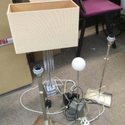 A Collection of modern table lamps including a perspex example and a pair of chrome lamps. 53 and 69cm tall. Postage category C