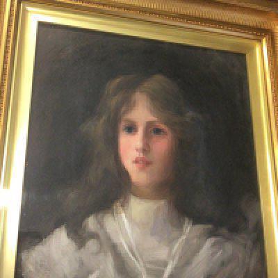 A gilt framed oil painting on canvas Portrait of a young Victorian girl signed E De Labourne. 66x58cm