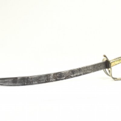 A Middle Eastern styled curved blade short sword with a brass hilt, three bar guard and an animal head pommel. 35cm long blade, total length 45cm. NO RESERVE