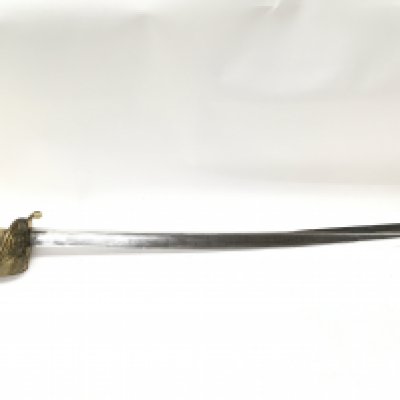 A naval officers dress sword with shagreen grip, brass hilt, lion heads pommel and a double fullered blade. 95cm long in total, blade length 80cm. This lot cannot be posted