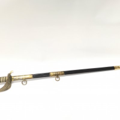 A naval officers dress sword Raser & Davi&rsquo;s Portsmouth with a brass hand guard, shagreen grip, leather and brass scabbard. Blade 73cm long, total sword length 88cm. This lot cannot be posted