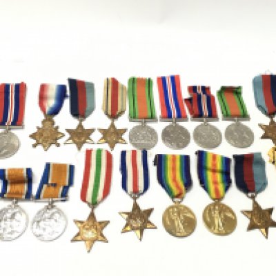 A Collection of WW1 and WW2 medals including Victory, Defence, 1939-45, Africa, France and Germany, Italy, 1914 stars. Presented to 31158 PTE. A.G. Day.G.GDS. , Thomas. J. Veness, 45489 PTE. F.W. Pannell. Suff. R etcPostage category B